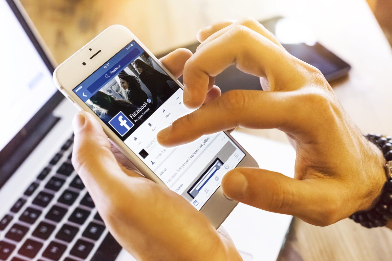 Person about to post on Facebook
